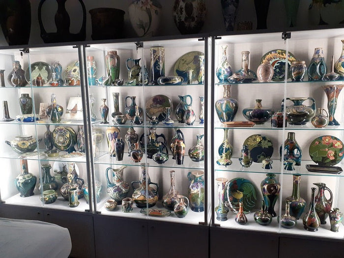 Memorabilia on Display: Create Stunning Themes with Glass Cabinets in Bars - Display Cabinets Direct