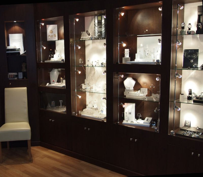 Safeguarding Elegance: Dual Benefits of Glass Displays in Retail - Display Cabinets Direct