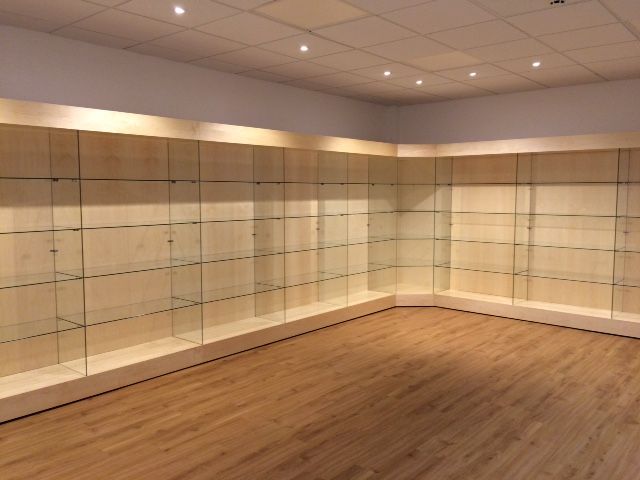 Showcasing Achievements: How Glass Cabinets Elevate Your Reception Space - Display Cabinets Direct
