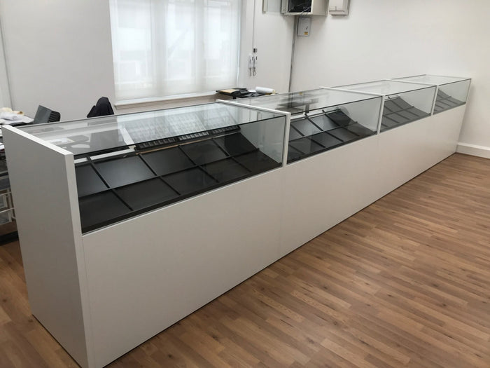 Why Every Business Needs Glass Showcases for a Professional Touch - Display Cabinets Direct