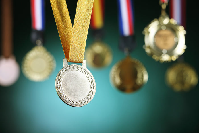 Filled with Excellence: How to Organize Your Trophy and Medal Display - Display Cabinets Direct
